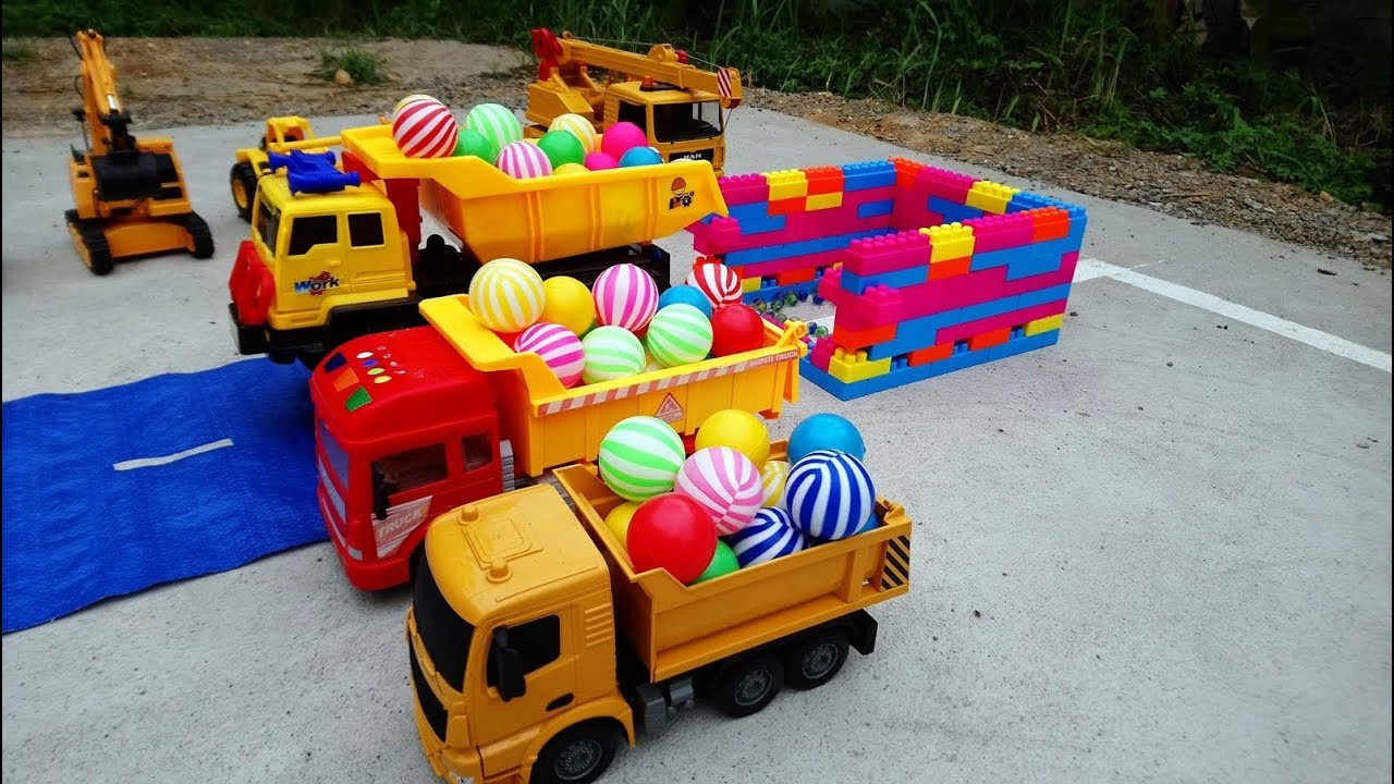Truck carrying balls and marbles for children Car for kids video