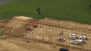 Aerials of barn construction collapse in Shelby County