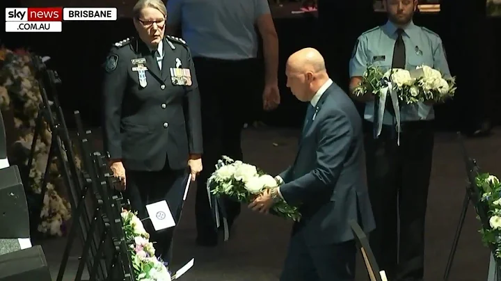 Peter Dutton lays wreaths for murdered police offi...