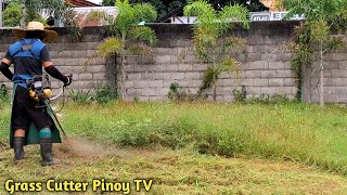 I TRIM THE VERY OVERGROWN GRASS 