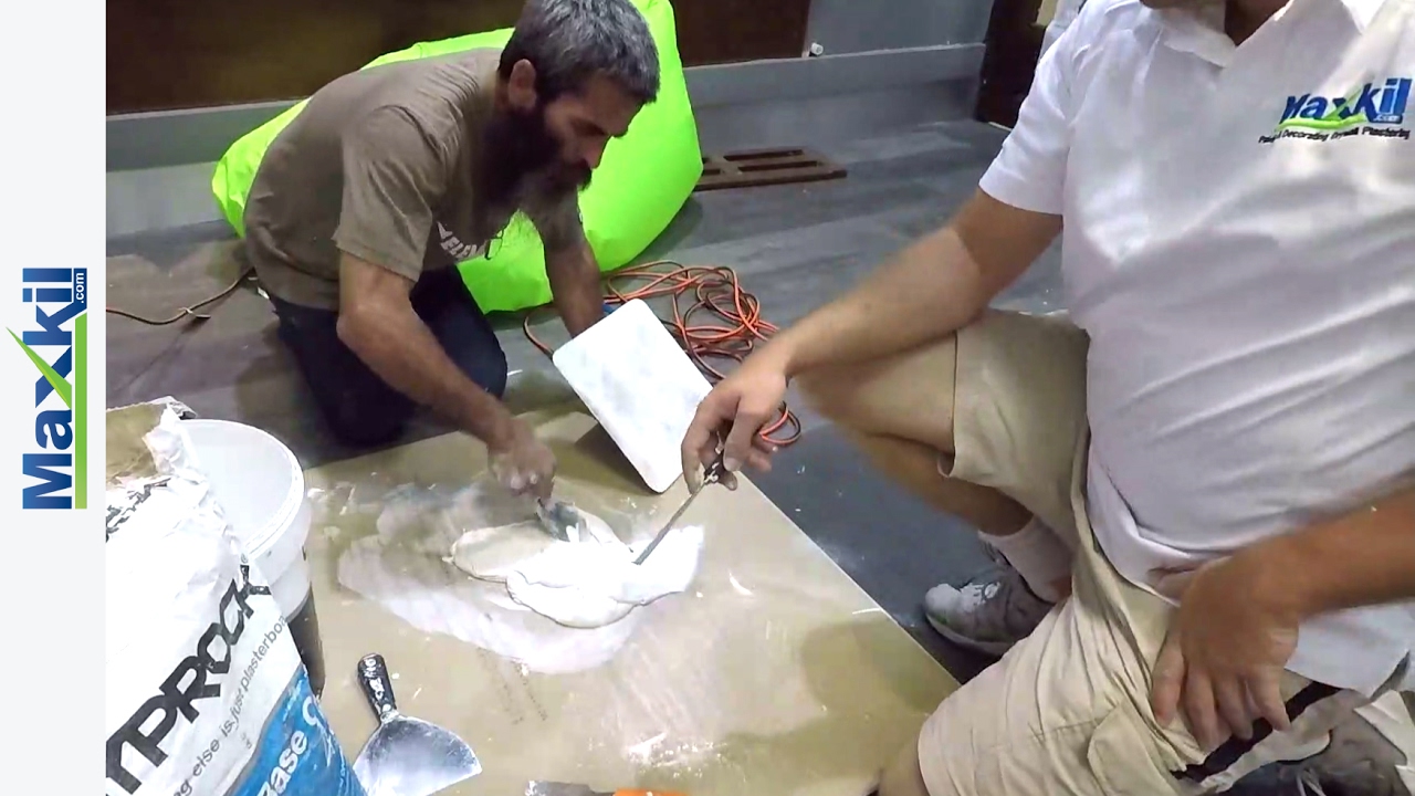 Quick drywall plastering repair in the city.