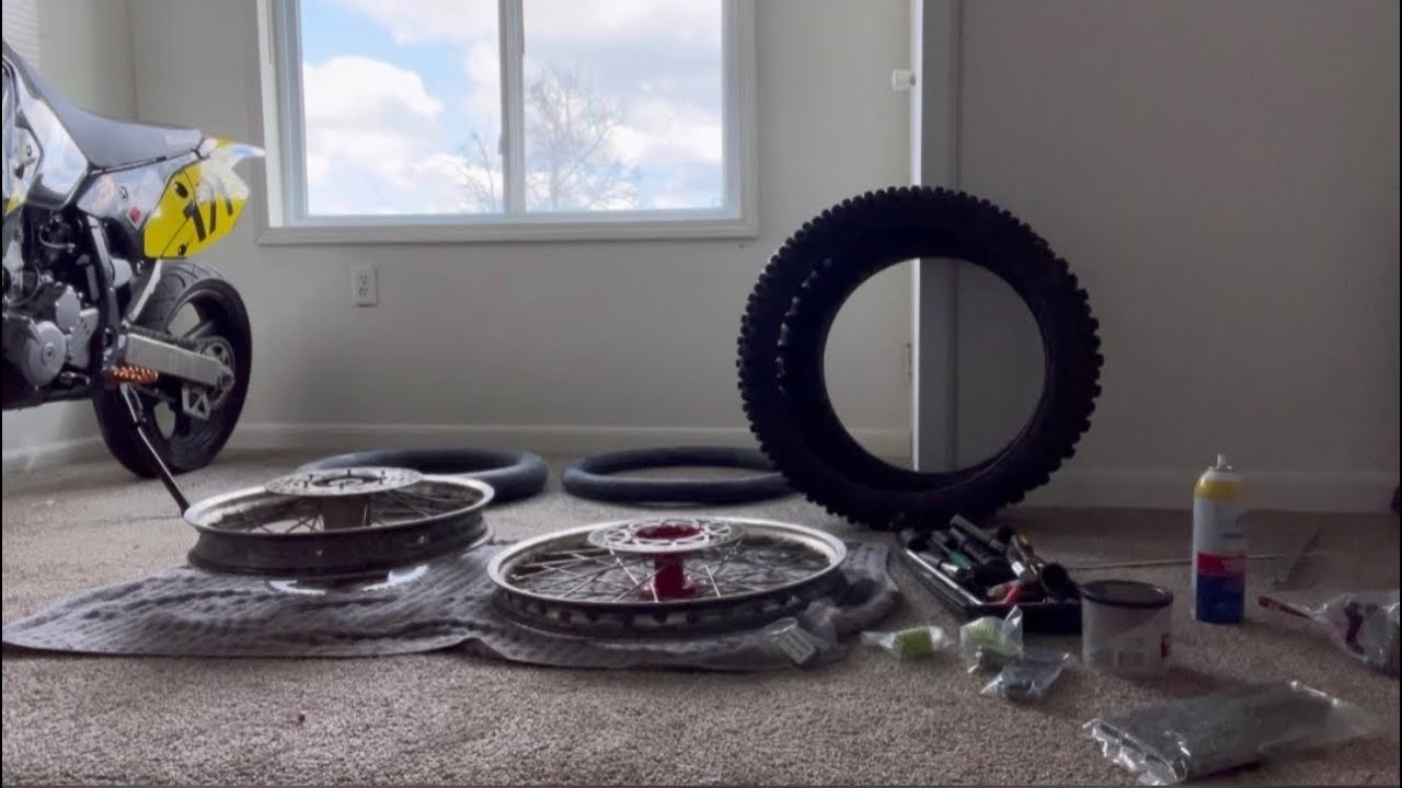 Turning my DRZ400 into a motocross bike part 2. I suck at putting tires
