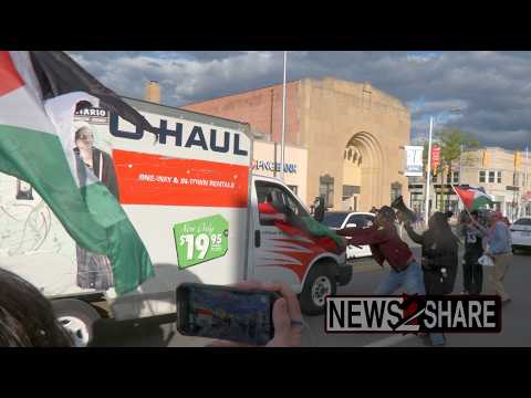 Jake Lang U-Haul struck as he drives past counter-protesters in Hamtramck, Michigan