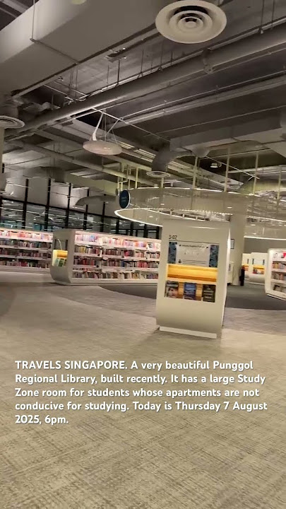 TRAVELS SINGAPORE. A beautiful spacious and welcoming library to acquire knowledge.