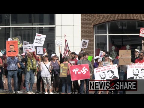 Anti-Trump protesters gather outside Tesla dealership in Georgetown ...