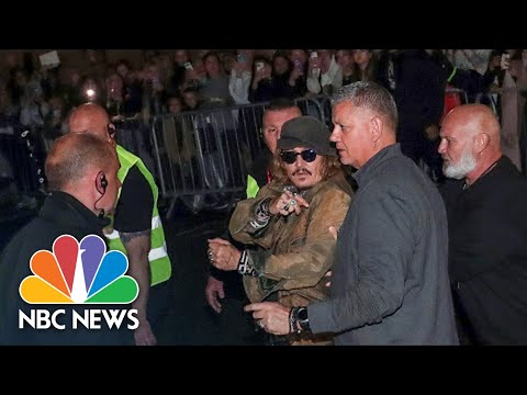 Johnny Depp Greets Adoring Fans At U.K. Concert Venue