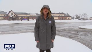 FOX 9's Karen Scullin suffers through the bad weather