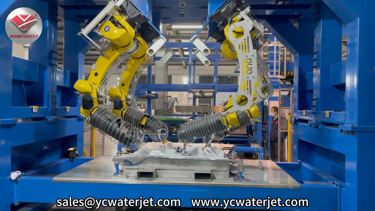 YC Waterjet cutting machine robotic waterjet cutter for automotive interior parts.