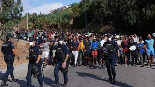 Spain moves hundreds of migrants from Ceuta beach to temporary shelters