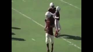 Football player tackles little football kid who has a potato as a heart