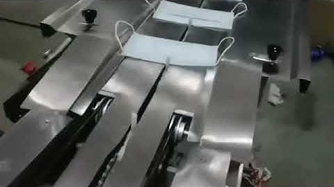 Automatic mask earloop folding machine