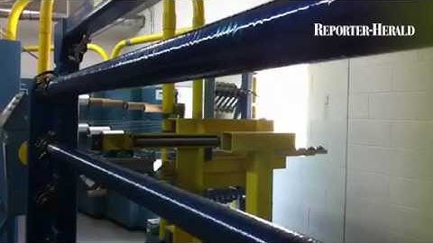 Ability Composites technician Adolfo Carrillo works on a filament winding machine. #Loveland @report