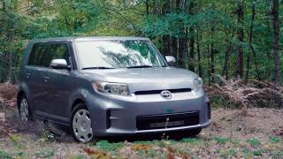 Scion XB slow motion through the woods