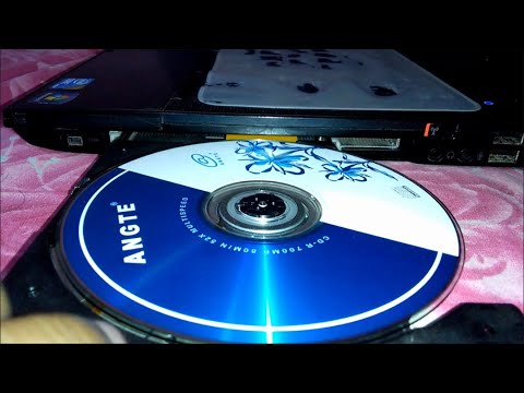 How to Insert  CD/DVD into DELL Laptop Computer