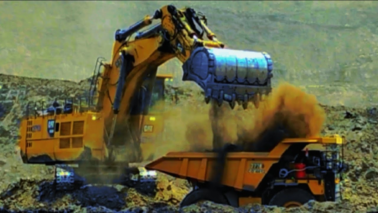 biggest-caterpillar-excavator-6030-loading-truck-tambang-cat777-youtube