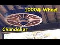 Hanging the !000# Chandelier | Wood Auto Truck Wheels | Engels Coach Shop