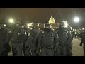 Chaotic scenes outside US Capitol as police kettle protesters after curfew | AFP