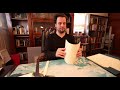 Hand binding a book and chatting