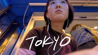 a girl, alone in tokyo