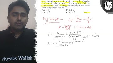 An α-particle moves in a circular path of radius 0.83  cm in the presence of a magnetic field of ...