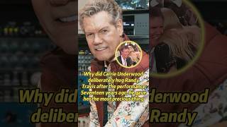 Why did Carrie Underwood deliberately hug Randy Travis after the performance?17 years ago