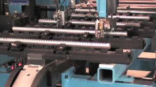 Robotically Loaded Baffle Press Automation