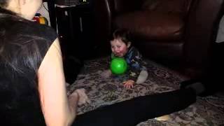 Baby Plays Ball