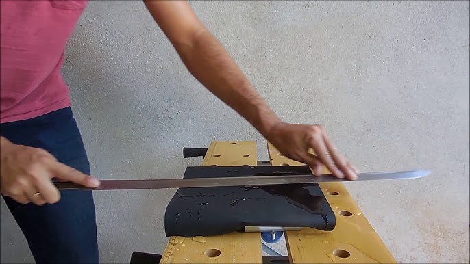 Sharpening a Sword by Hand 