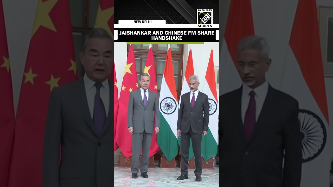 Delhi: EAM Dr S Jaishankar and Chinese FM Wang Yi share handshake at Hyderabad House