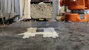 Lifting a block with an offset using an ABB IRB2400 robot without calibration