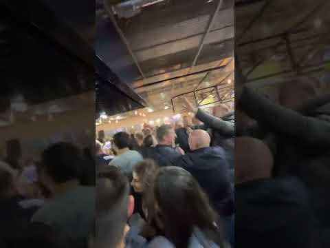 Spurs fans singing in end shelf bar