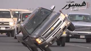 Chevy Truck driving on two wheels