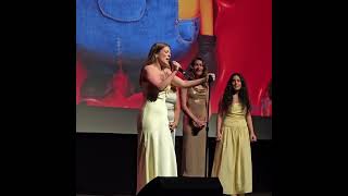 A woman sings “Bohemian Rhapsody” in Minionese at the premiere of #Minions & Monsters