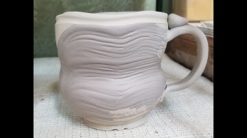 Adding a coil built handle to a pottery mug