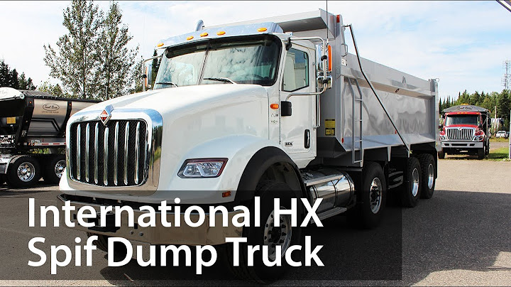 How many tons can a tri axle dump truck haul