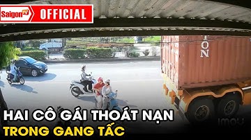 Hai cô gái thoát nạn trong gang tấc khi container bất ngờ lùi | Tin tức SaigonTV