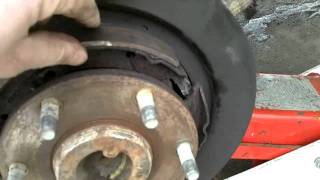 E-brake pads broke off and grenaded my caliper bracket. 59,000 miles
on a 2008.5 titan