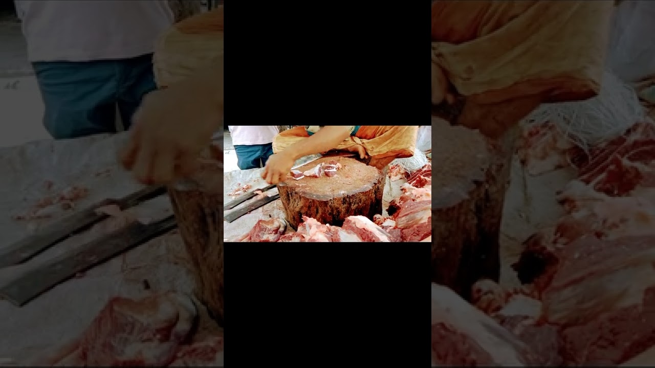 Exclusive beef/meat cutting by young skilled butcher. 