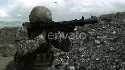 Slow motion clip of soldier shooting automatic weapon. | Stock Footage - Envato elements