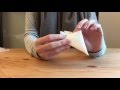 How to fold a plastic bag into a triangle to save space