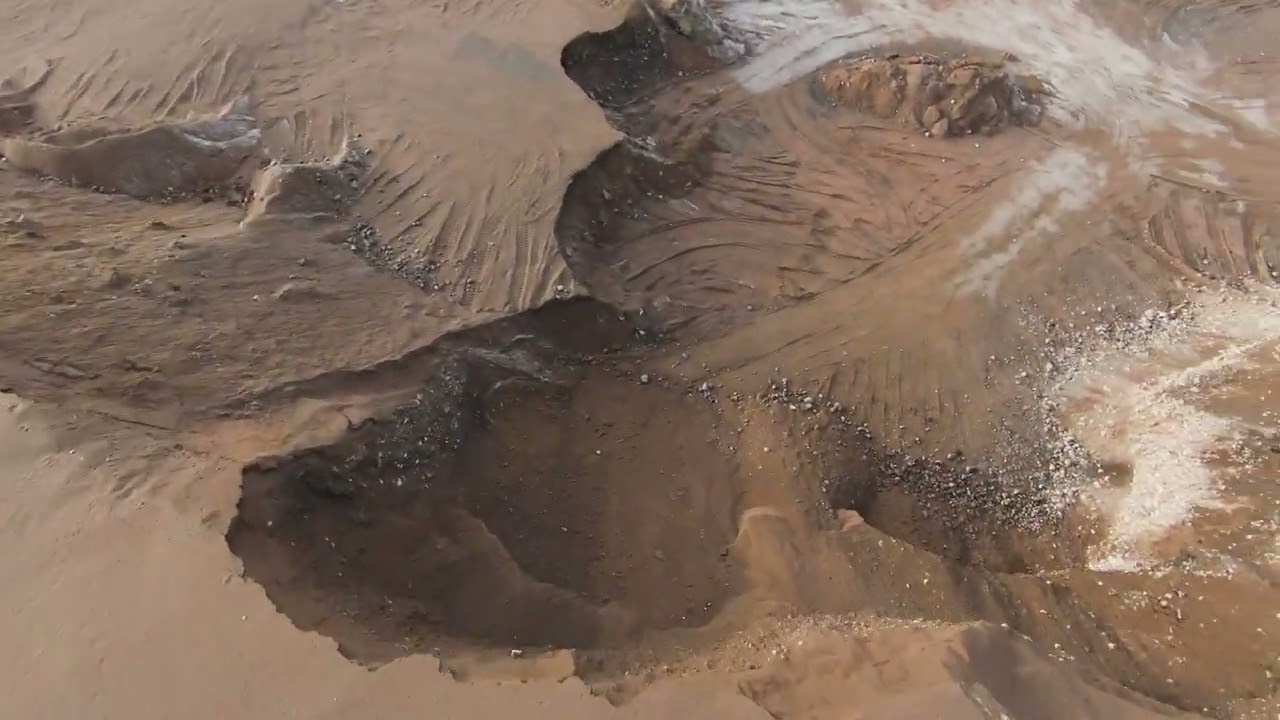 DJI FPV exploring a sand quarry