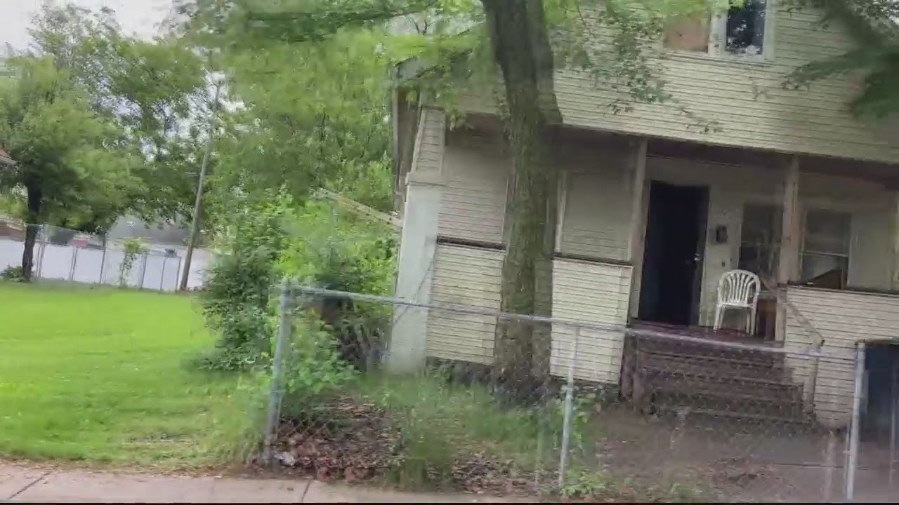 Activists marching past Detroit drug house to call for peace
