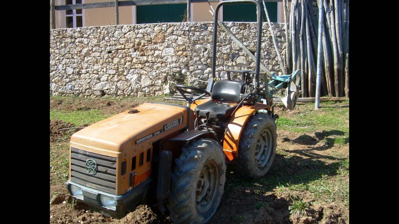 Aratura con antonio carraro supertigre 3700 e aratro bivomere olivero