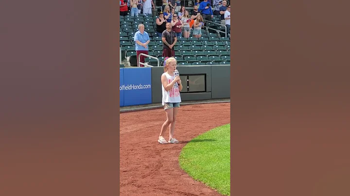 Aliya singing the National Anthem at the Wichita W...