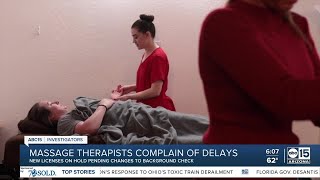 Massage therapists say they are losing work because of licensing delay