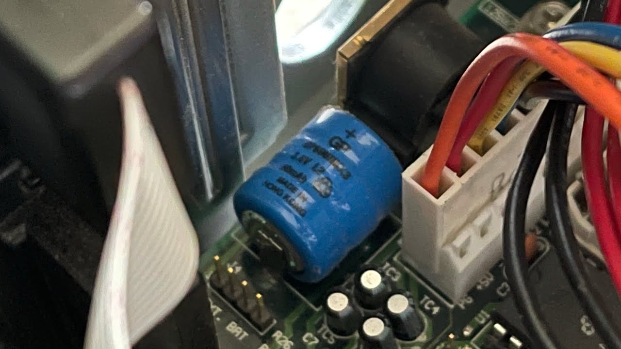 Removing the Leaking Barrel Battery From My AMD 386 PC.