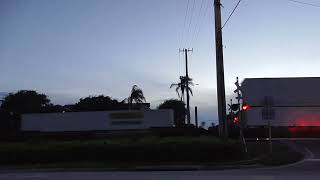 FEC Freight Train 208-11 With Champs Plus Tri Rail At Boynton Beach 6-11-25