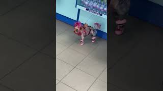 Well-Dressed Dog With Colored Hair Ready for a Stroll