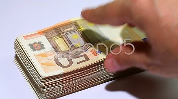 Spending Money. Timelapse video hand taking fifty euro notes. Stock Footage