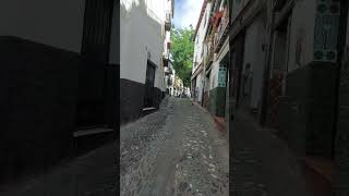 Walk in Old Granada streets South Spain you can hear it living